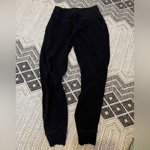 Pair of Lululemon joggers size 4 color black